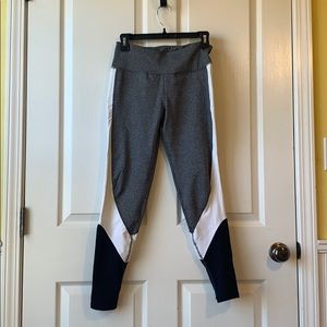 grey , black , and white yoga / workout pants